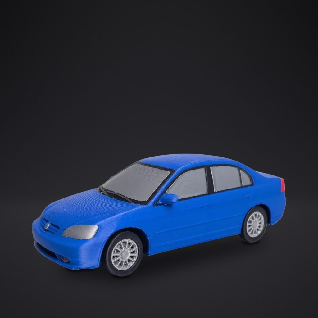 Voiture miniature imprimée en 3D — projet « Vos idées, imprimées », Komplice3D