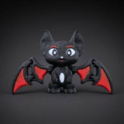 Chauve-souris articulée – noire aux ailes rouges, impression 3D